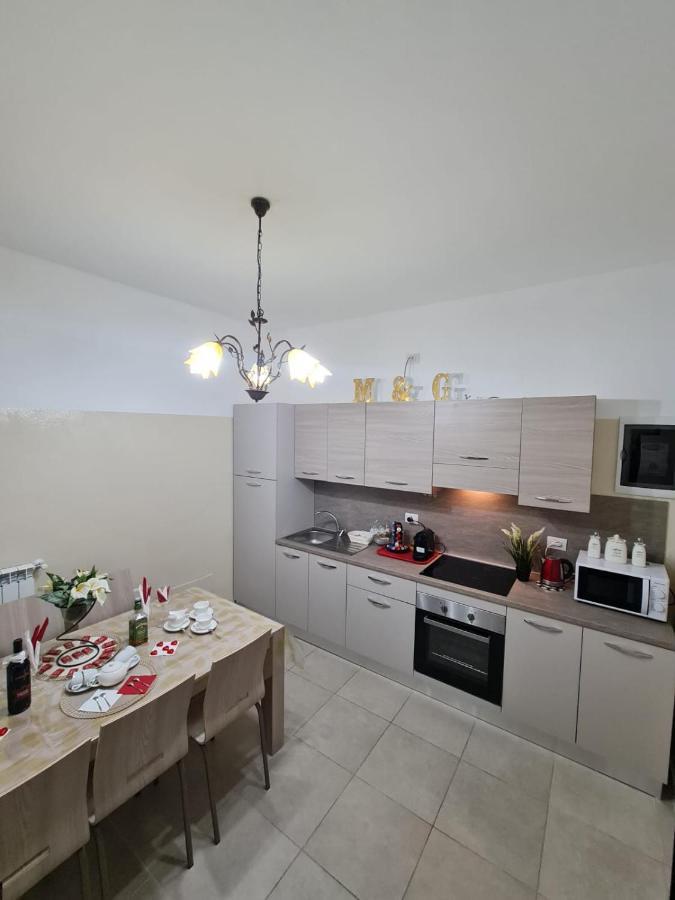 Curti Granda Hotel Rescaldina Bagian luar foto